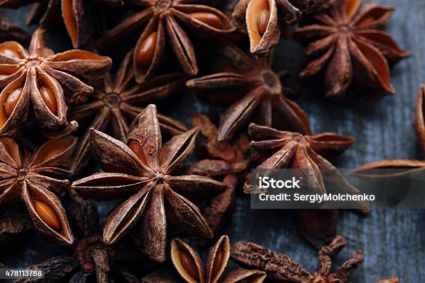 Star Anise Seeds On The Wooden Background Stock Photo - Download Image Now - Anise, Star Anise, Chinese Culture