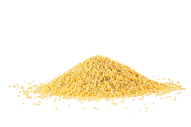 istock Heap of millet isolated on white 478113936