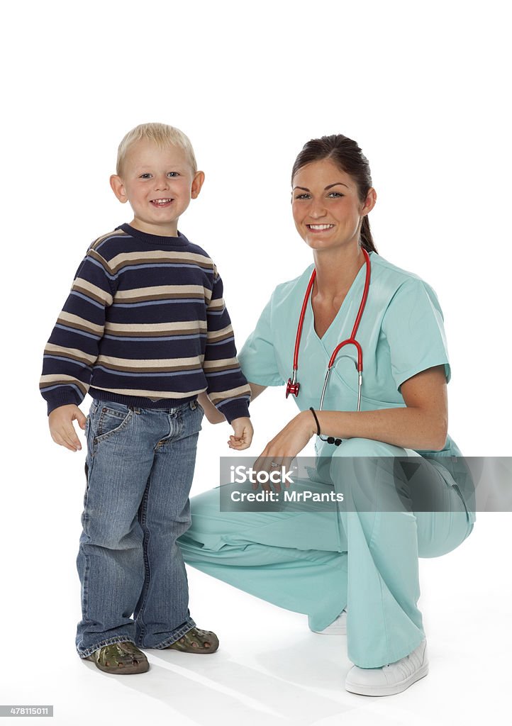 Nurse and Child on White Pretty young nurse with young boy on white background White Background Stock Photo