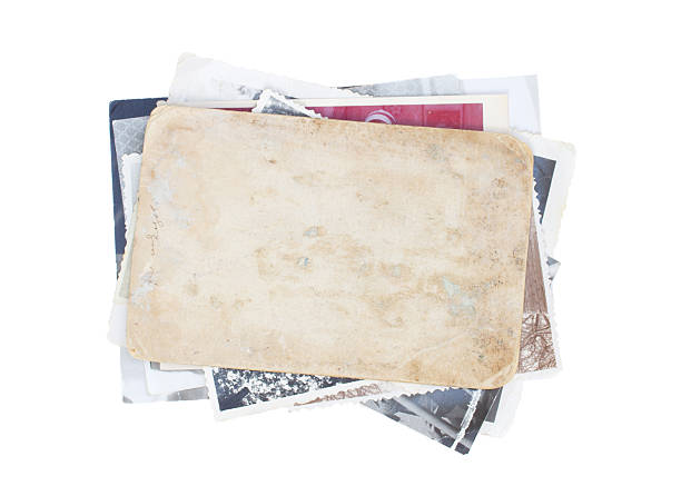 istock pile of aged photos 478115153