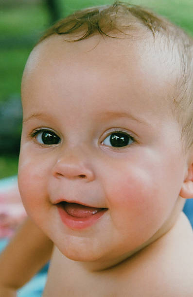 istock Baby having fun in the sun 478116837