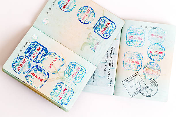 istock Visas and stamps in passport 478117170