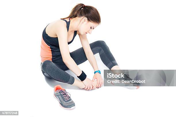 Portrait Of A Sporty Woman With Pain On Leg Stock Photo - Download Image Now - 2015, Activity, Adult