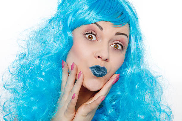 istock woman with a blue wig 478117674