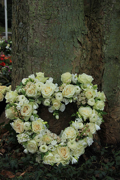 istock Heart shaped sympathy flowers 478120734