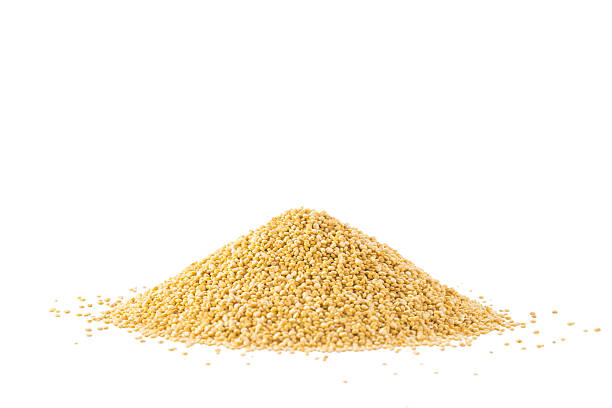 istock Pile of quinoa seeds isolated on a white 478120852
