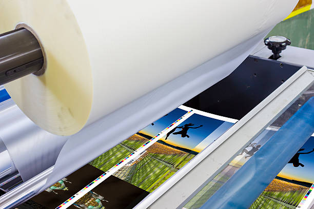 istock Print sheet-fed paper feeder unit. Poster laminator 478121422