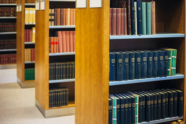 istock Old Vintage Books On Wooden Shelfs In Library 478125182