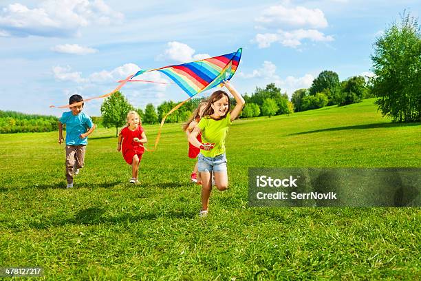 Group Of Kids With Kite Stock Photo - Download Image Now - Child, Kite - Toy, Flying
