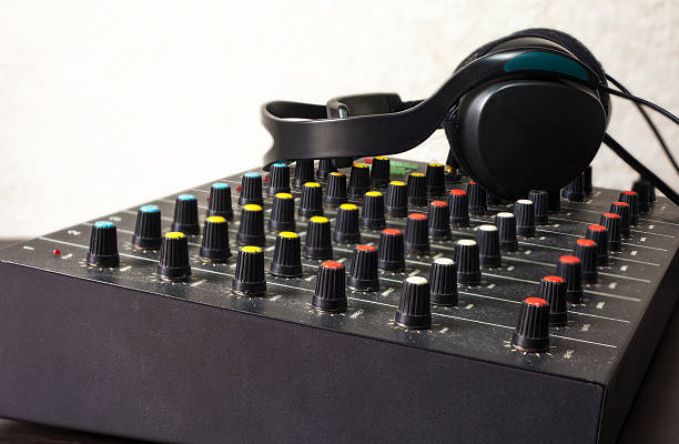 istock DJ mixer with headphones 478128617