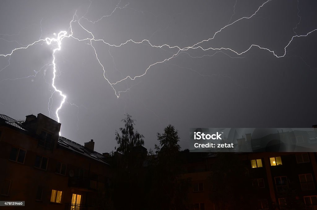 thunder lighting bolt onnight sky thunder lighting bolt under city night sky 2015 Stock Photo