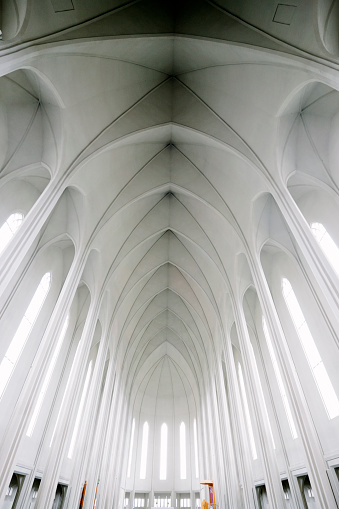 Hallgrímskirkja, Lutheran Cathedral Church of Raykjavik, interior view of the contemporary architecture. View of the interior ceiling, nobody, vertical composition. 