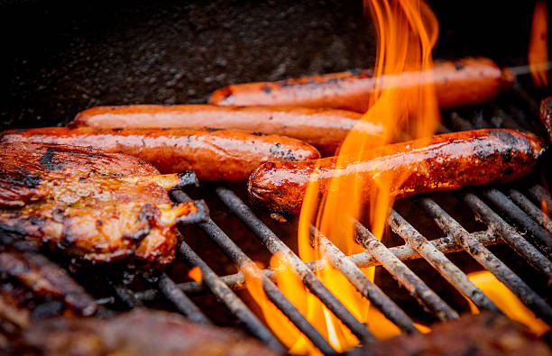 istock hot dogs and ribs on a grill 478134522