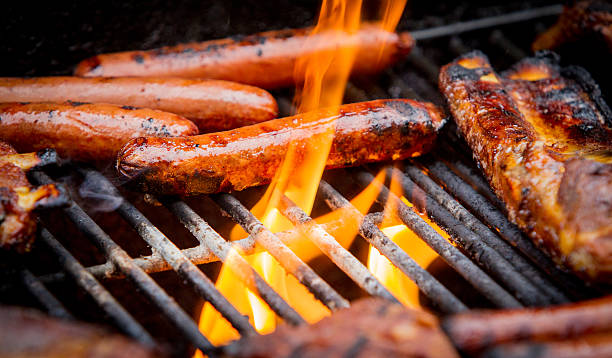 istock hot dogs and ribs on a grill 478134526