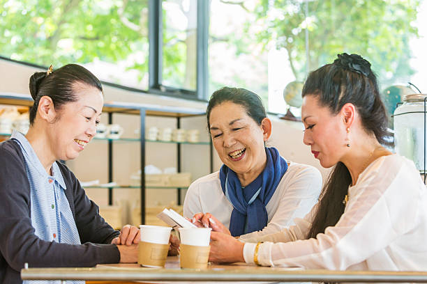 istock Japanese Women Talking in a Cafe 478137686