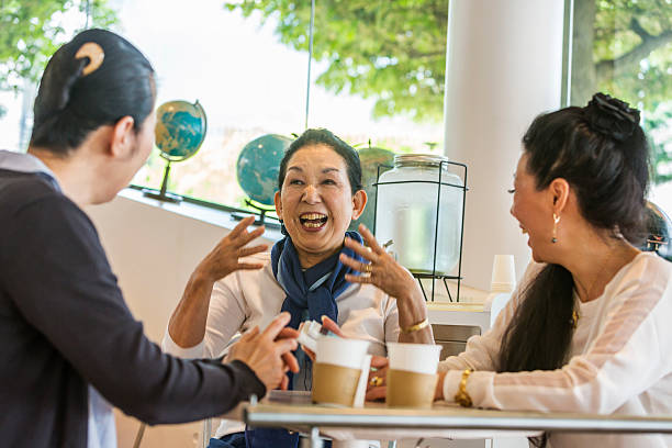 istock Japanese Women Talking in a Cafe 478137702