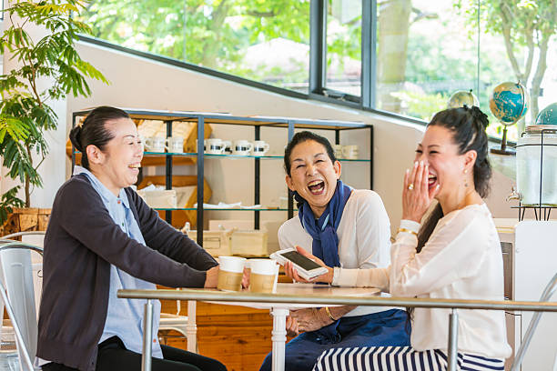 istock Japanese Women Laughing in a Cafe 478137716