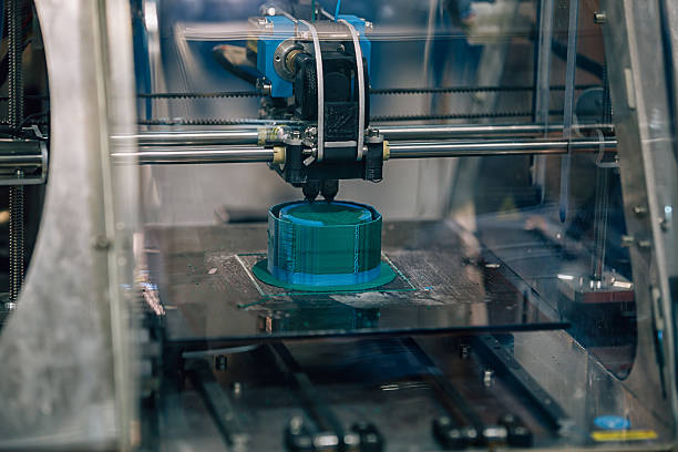 istock 3D printing machine detail in action 478137734