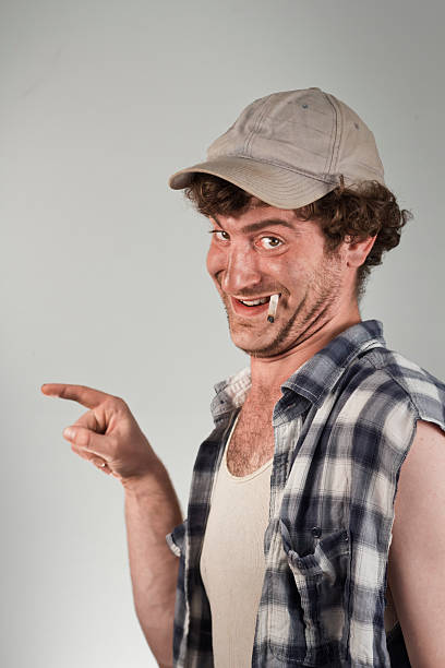 Tattling Redneck Tattling redneck points the blame to rat himself out of trouble grotesque stock pictures, royalty-free photos & images