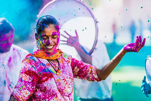 Indian people celebrating the Holi Festival of Colors.