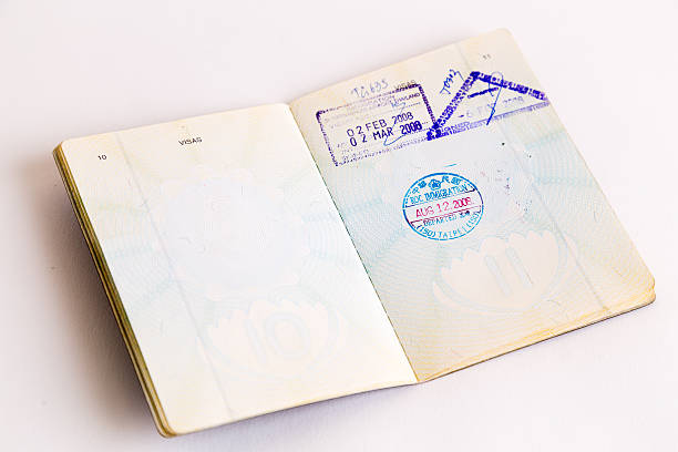 istock Visas and stamps in passport 478142128
