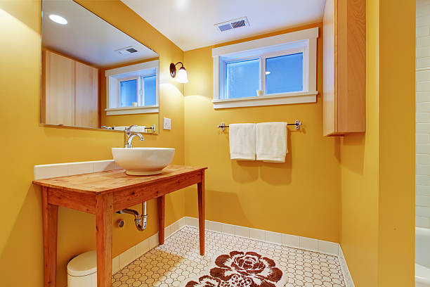 istock Orange modern bathroom with round sink. 478144685
