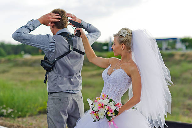 istock bride and groom on railway tracks 478146723