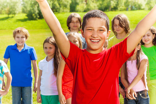 istock Happy boy with lifted hands 478146983