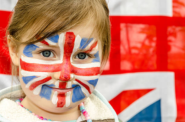 Girl with Union Jack flag face painting stock photo