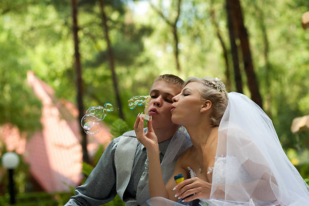 istock Groom and Bride in the park 478151229