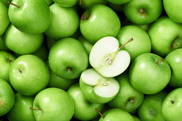 Granny smith apple background Green apple Raw fruit and vegetable backgrounds overhead perspective, part of a set collection of healthy organic fresh produce GREEN APPLE stock pictures, royalty-free photos & images