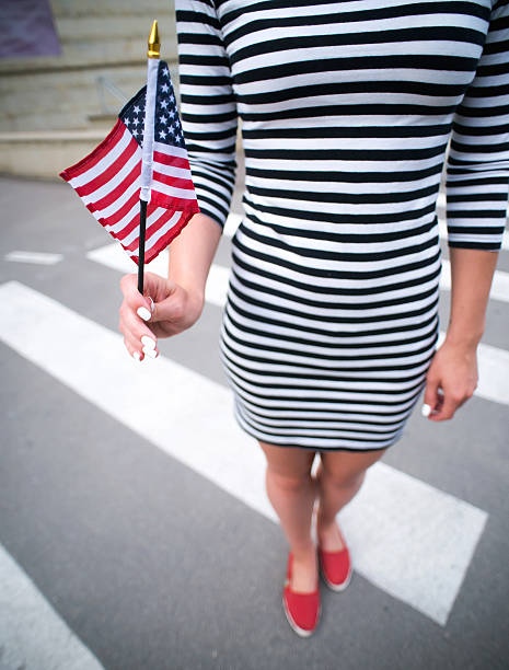 woman hand holding american flag