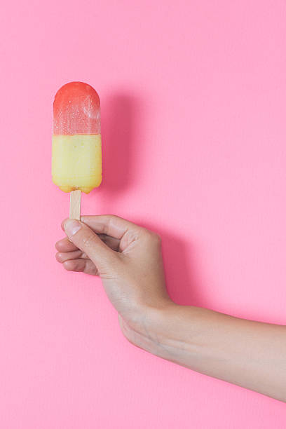 istock Woman hand holding icecream 478158828