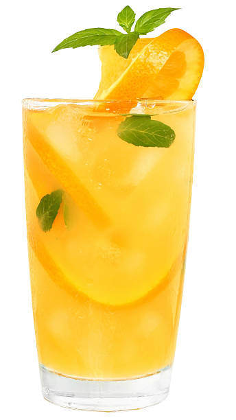 istock Cocktail with orange juice and ice cubes decorated leaf mint 478160717