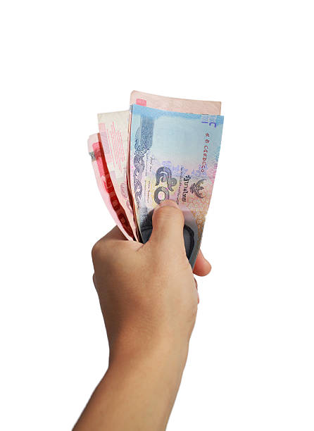 istock thai cash in hand 478162023