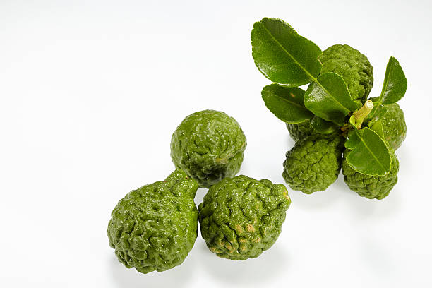 istock Kaffir Lime with leaves isolated on white backround 478166080