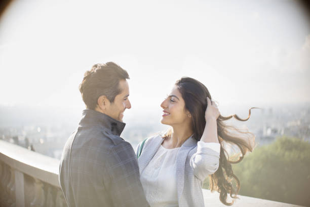 istock Couple hugging on urban balcony 478167187