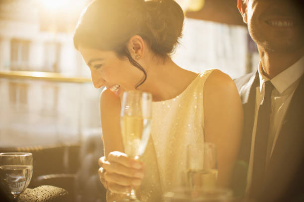couple having champagne together - romantic scene 뉴스 사진 이미지