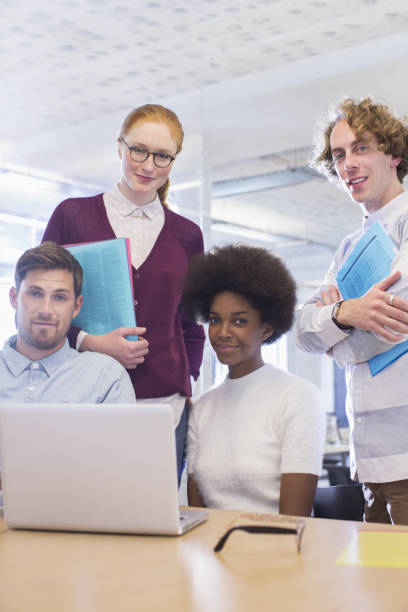 istock Business people smiling in meeting 478167945