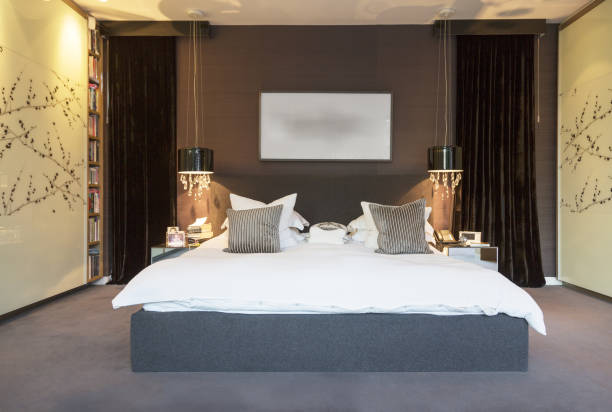 istock Lamps and wall art in modern bedroom 478168135