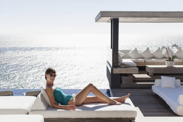 istock Woman relaxing on sofa outdoors 478168283