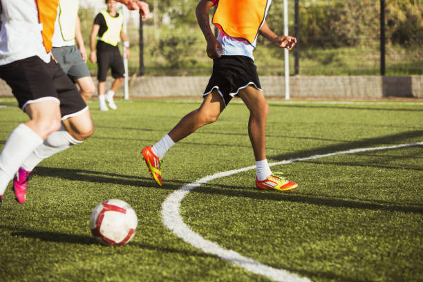 istock Soccer players training on field 478168877