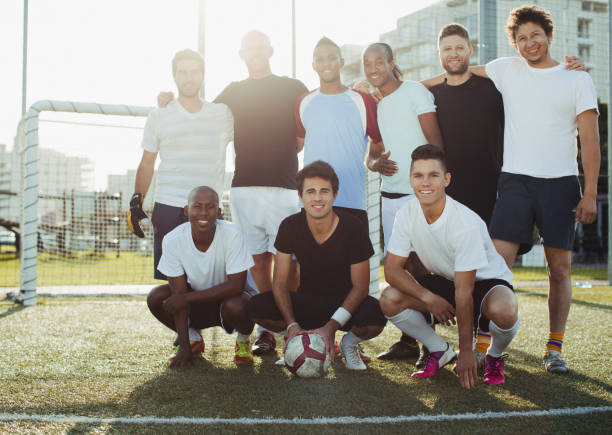 istock Soccer players smiling on field 478168909