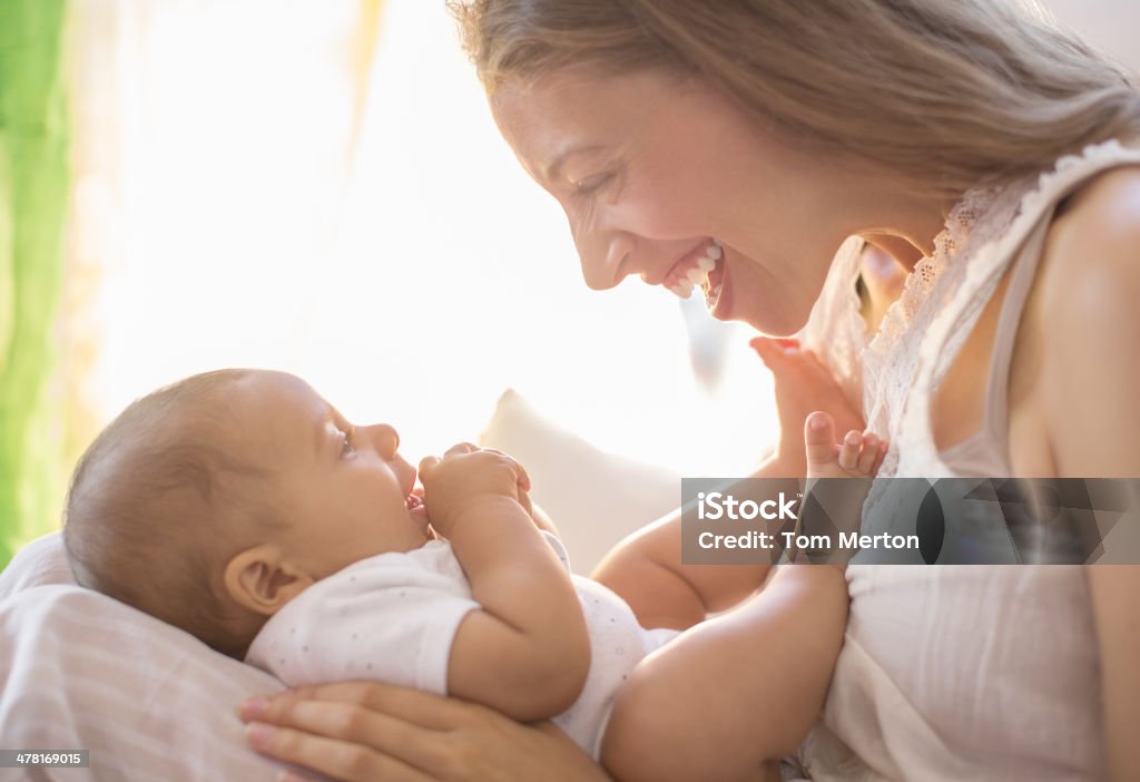 Mother holding baby boy  Baby - Human Age Stock Photo