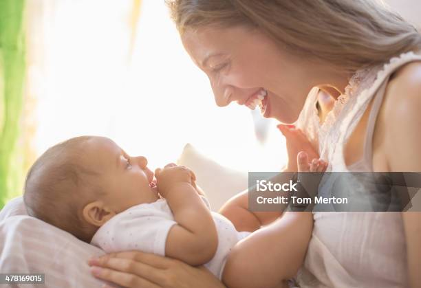 Mother Holding Baby Boy Stock Photo - Download Image Now - Baby - Human Age, Mother, Face To Face