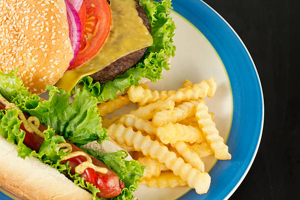 istock Cheeseburger Hotdog Fries 478171084