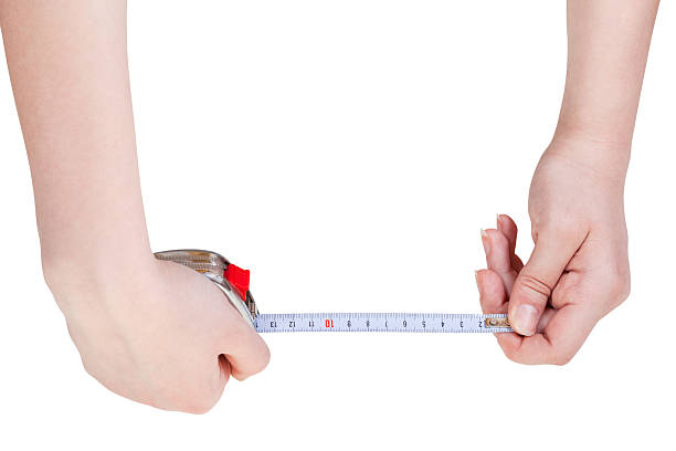 istock woman hands with measuring tape isolated 478171112