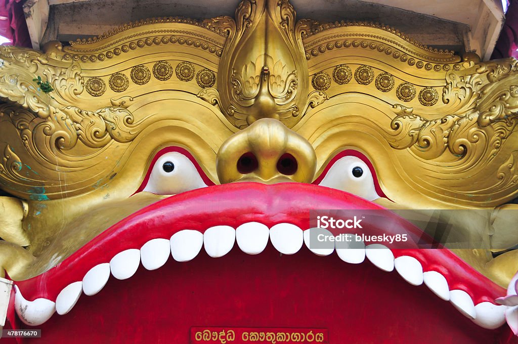 Stone lion at entrance of pagoda Stone lion at entrance of pagoda in Rangoon (Burma). 2015 Stock Photo