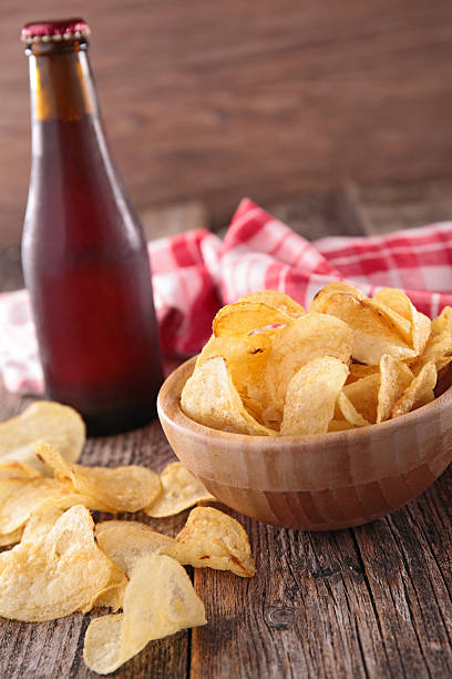 istock potato chip and beer bottle 478176934