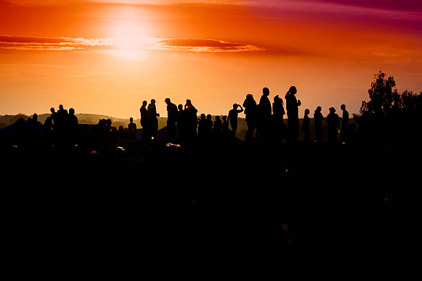 istock Group of people admire the sunset 478184352